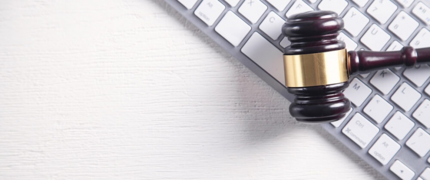 Auction gavel on keyboard to signify online auction
